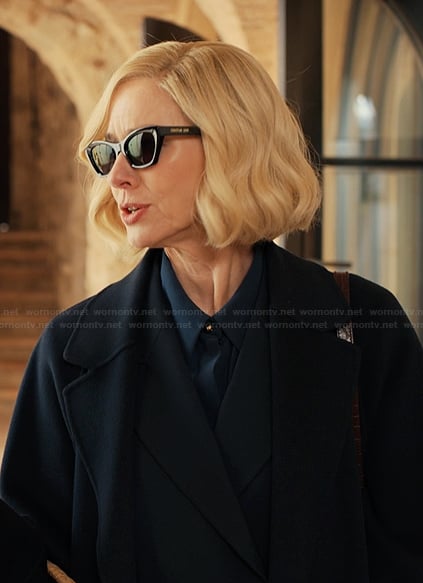 Liberty’s black sunglasses on Alls Fair