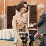 Emily’s mixed print strapless dress on Emily in Paris