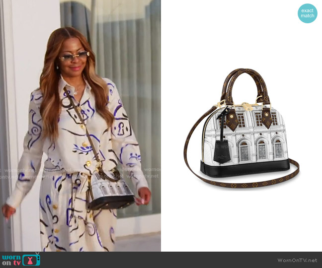 Louis Vuitton x  Fornasetti  Alma Handbag worn by Mary Cosby on The Real Housewives of Salt Lake City
