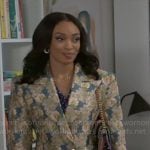 Madison's long floral coat on Beyond the Gates