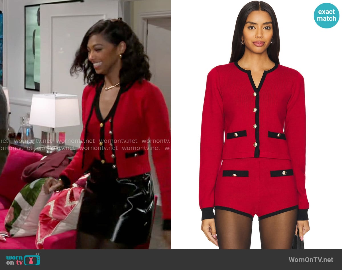 Kat’s red cardigan on Beyond the Gates