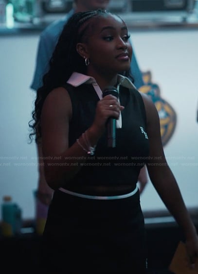 Marissa's black contrast polo top on Bel-Air