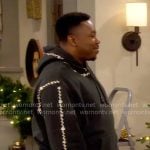 Marty’s embroidered hoodie and red houndstooth shorts on The Neighborhood