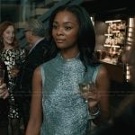 Nabria’s metallic drape top on Elsbeth