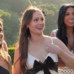 Mikayla’s white dress with contrast bow on The Kardashians