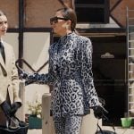 Mindy’s white leopard print blazer and jumpsuit on Emily in Paris