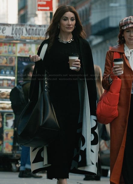 Nadine's black coat on Elsbeth