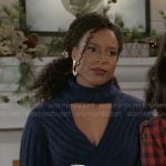 Naomi's navy blue sweater with buckle detail on Beyond the Gates