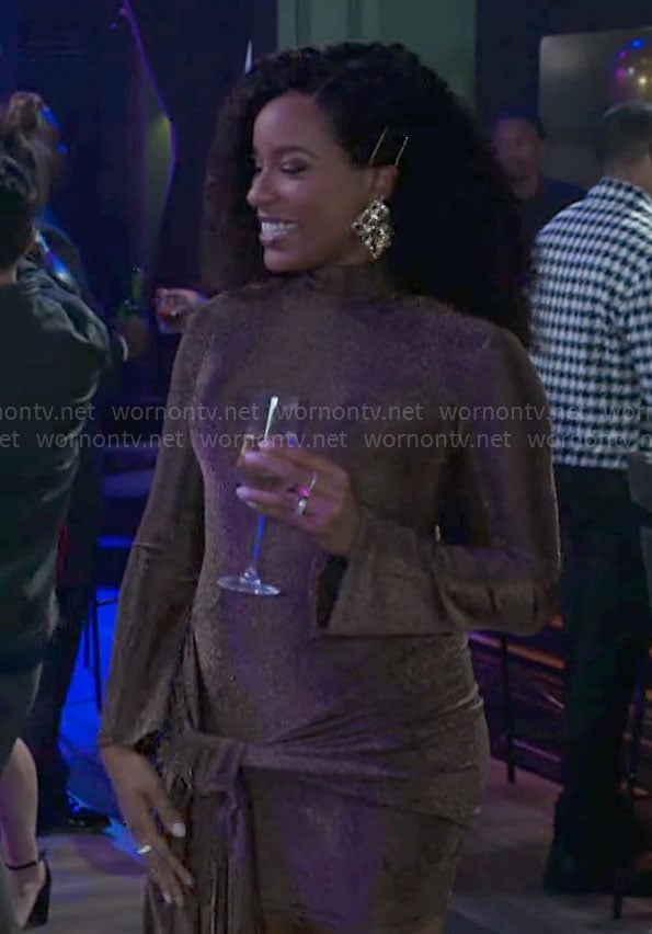 Naomi’s bronze NYE dress on Beyond the Gates