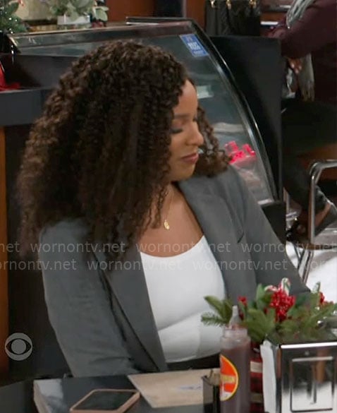 Naomi’s grey blazer with lace-up sides on Beyond the Gates