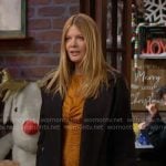 Phyllis’s orange ruched front dress on The Young and the Restless