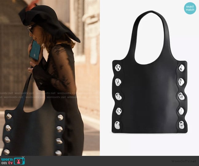 Published By Side Stone Leather Tote Bag worn by Sylvie (Philippine Leroy-Beaulieu) on Emily in Paris
