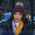 Emilie’s navy down coat and purple knit beanie on Today