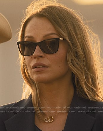 Rebecca's black sunglasses and bag on Landman