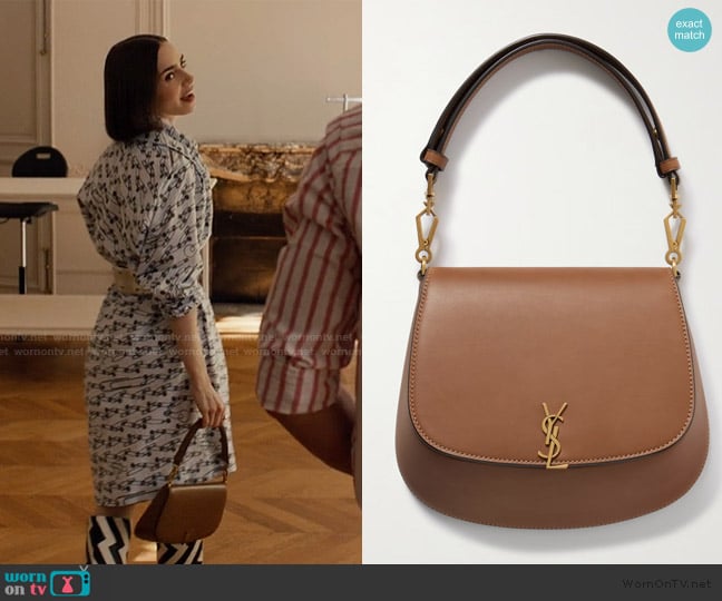 Saint Laurent Leather Voltaire Top-Handle Bag worn by Emily Cooper (Lily Collins) on Emily in Paris