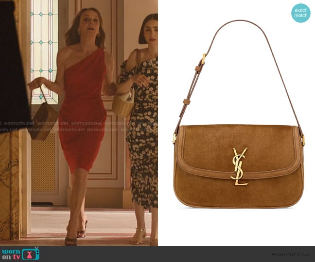 Saint Laurent  Solferino Medium Shoulder Bag in Suede worn by Sylvie (Philippine Leroy-Beaulieu) on Emily in Paris