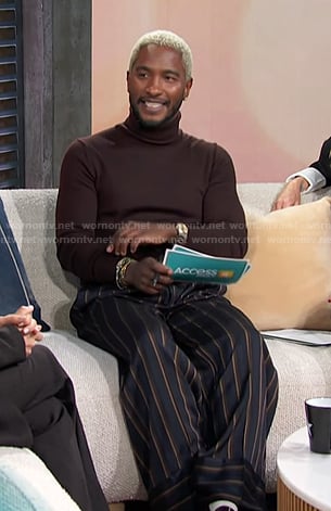 Scott’s brown turtleneck and navy striped pants on Access Hollywood