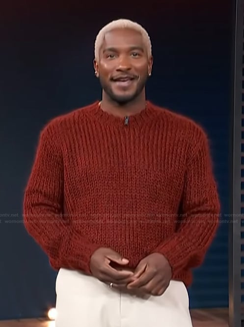 Scott’s red knit sweater on Access Hollywood