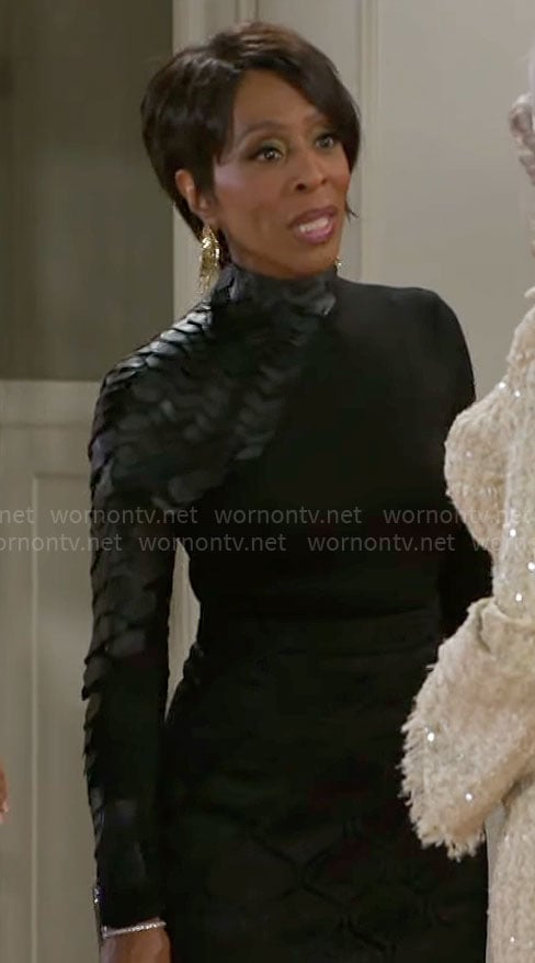 Sharon’s black scale detail top on Beyond the Gates