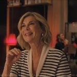 Yvette’s white stripe tie neck top on Emily in Paris