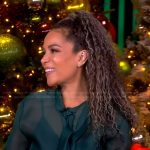 Sunny’s green sheer tie neck blouse on The View