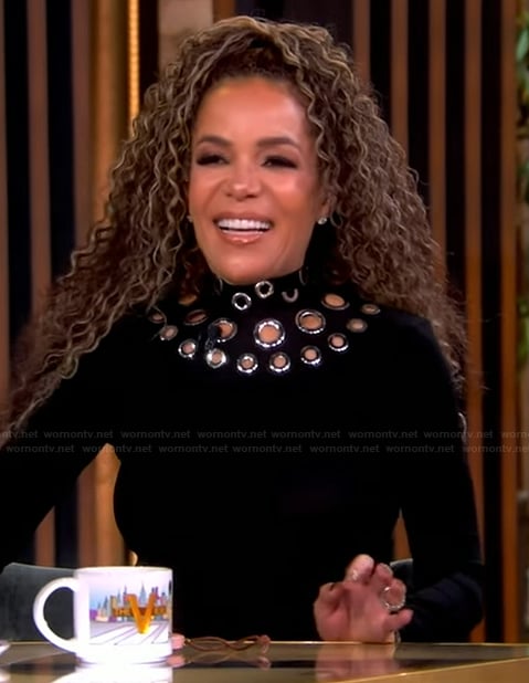 Sunny’s black grommet embellished top on The View