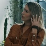 Sveta’s brown satin jumpsuit on Elsbeth