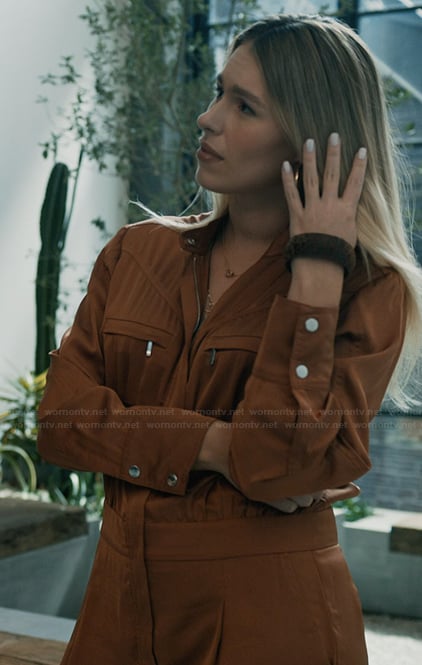 Sveta’s brown satin jumpsuit on Elsbeth