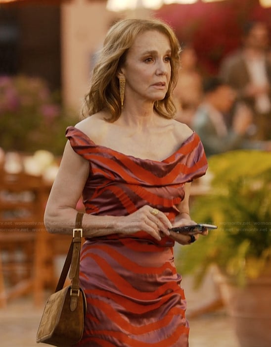 Sylie’s velvet striped off shoulder dress on Emily in Paris