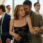 Sylvie’s black lace fringe dress on Emily in Paris