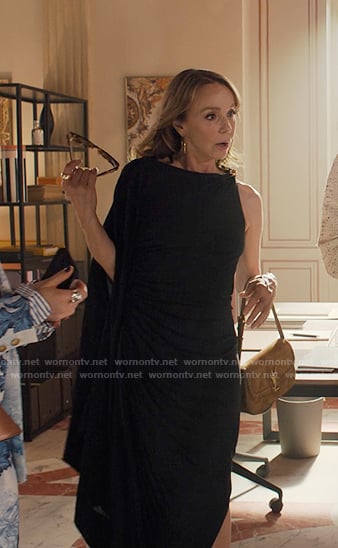 Sylvie’s black one-shoulder draped dress on Emily in Paris