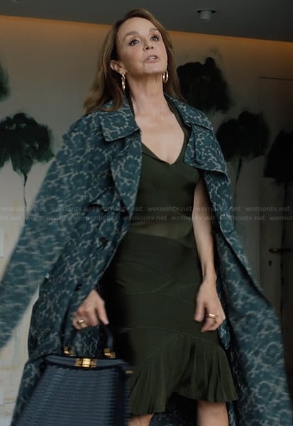 Sylvie's printed coat and sheer dress on Emily in Paris