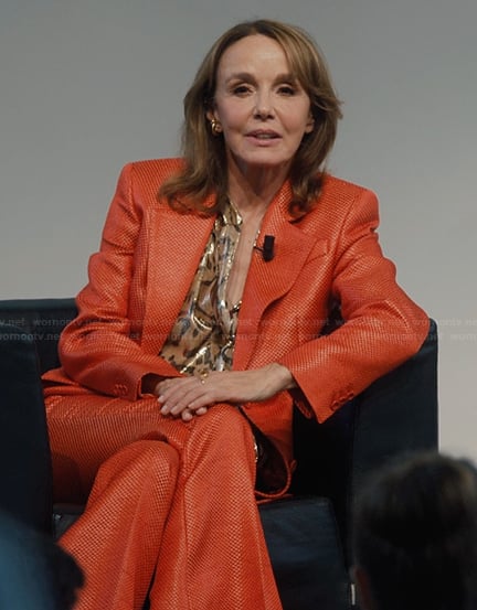 Sylvie's red metallic blazer and pants on Emily in Paris