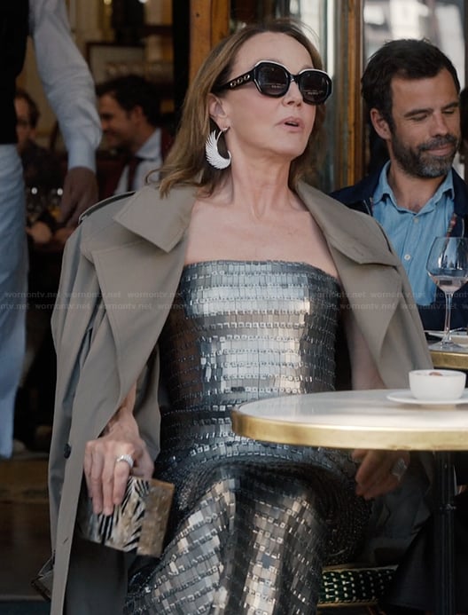 Sylvie’s silver metallic dress and sunglasses on Emily in Paris