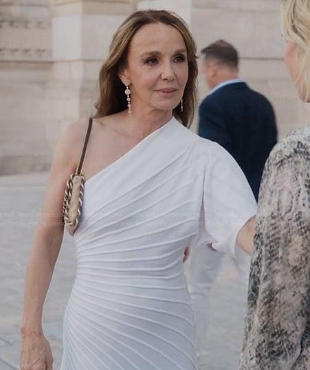 Sylvie's white pleated one shoulder dress on Emily in Paris