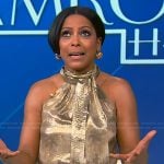 Tamron’s gold metallic halter top on Tamron Hall Show