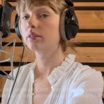 Taylor Swift’s white ruffle trim top on The End of an Era