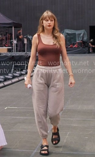 Taylor Swift's brown tank top and TTPD sweatpants on The End of an Era