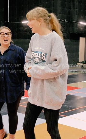 Taylor Swift's Eagles sweatshirt and textured leggings on The End of an Era