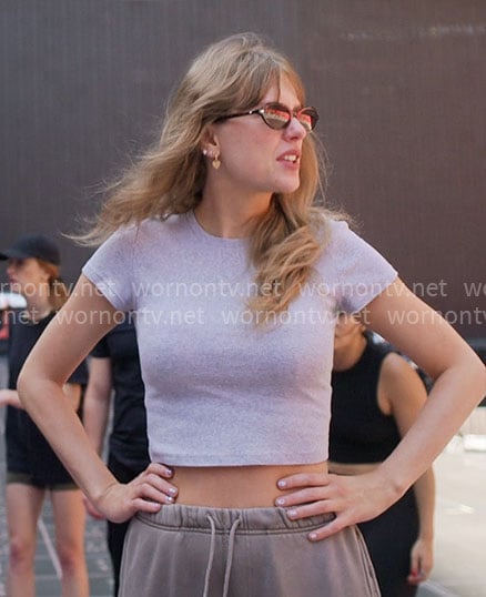 Taylor Swift's grey baby tee and taupe sweatpants on The End of an Era