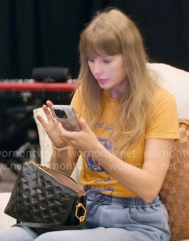 Taylor Swift's orange kitty tee on The End of an Era