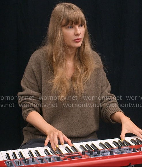 Taylor Swift’s taupe brown v-neck sweater on The End of an Era