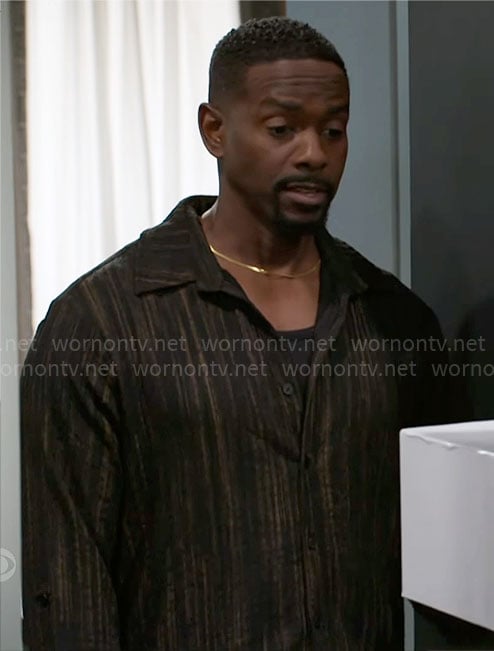 Ted’s black and gold stripe shirt on Beyond the Gates