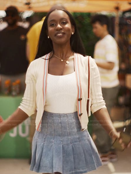 Teedra's stripe trim cardigan and denim skirt on Bel-Air