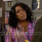 Tina’s purple dotted print top on The Neighborhood