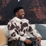 Trell Thomas's white and brown animal print sweater on Access Hollywood