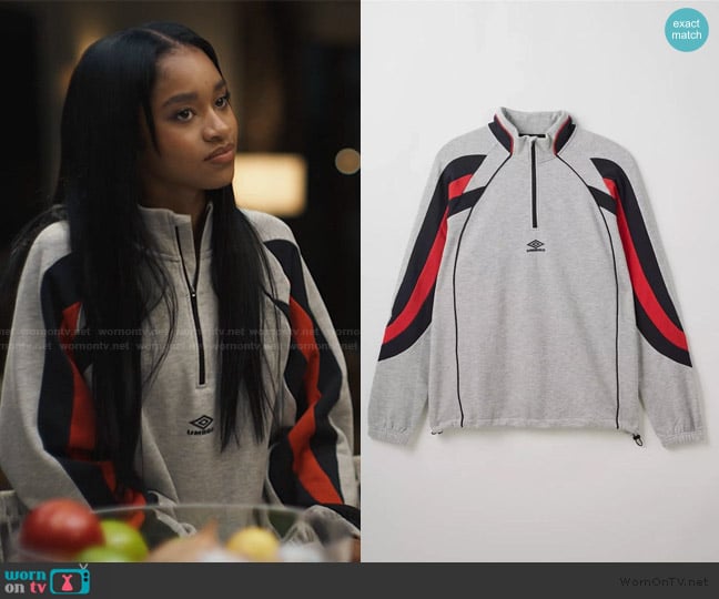 Umbro Striped quarter-zip sweatshirt worn by Ashley Banks (Akira Akbar) on Bel-Air