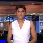 Jericka’s white sleeveless surplice dress on CBS Evening News