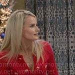 Vanessa’s red dress with heart buttons on Beyond the Gates