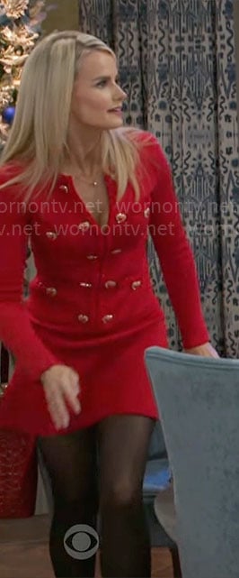 Vanessa's red dress with heart buttons on Beyond the Gates